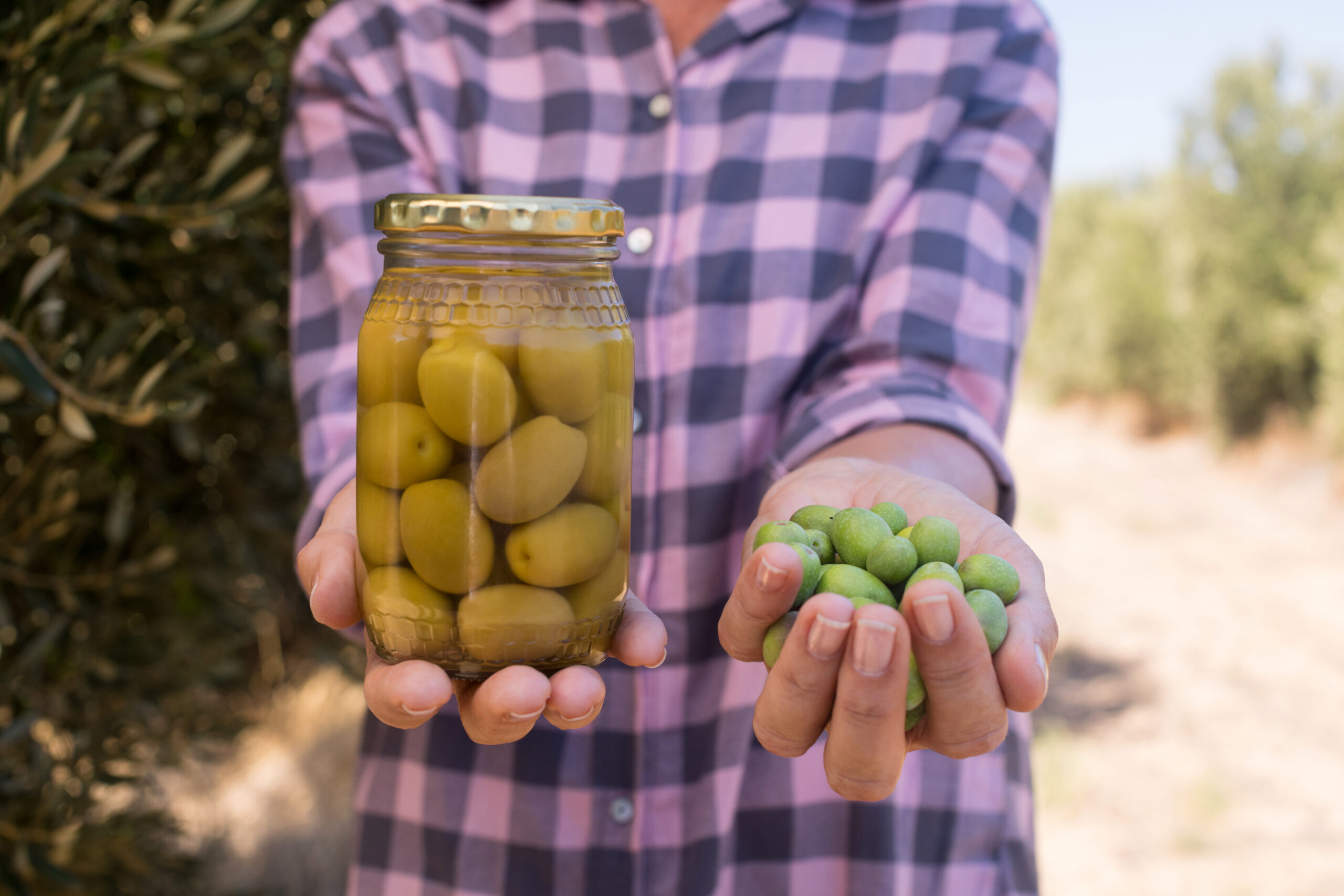 Woman holding olives